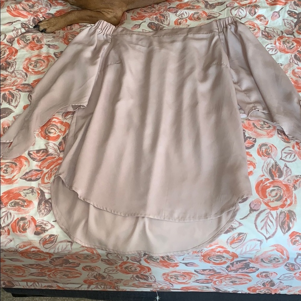 Quarter sleeve off the shoulder shirt